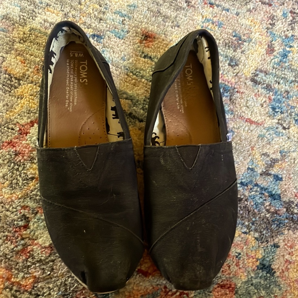 TOMS Black Canvas Slip-Ons